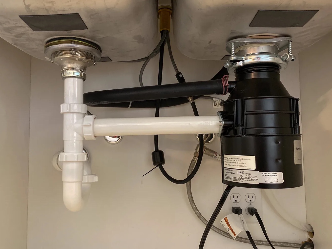 Leaky Garbage Disposal Cleanup in Redmond, WA